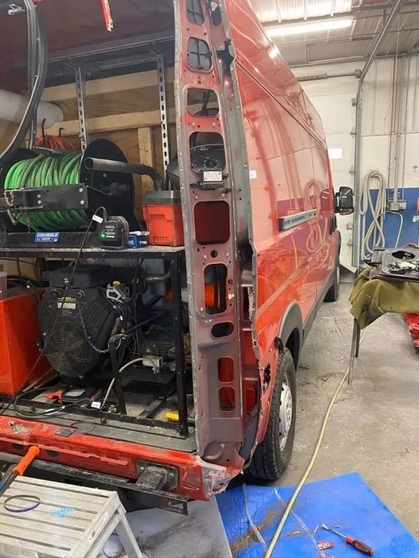 RAM ProMaster van with damaged rear corner structure removed